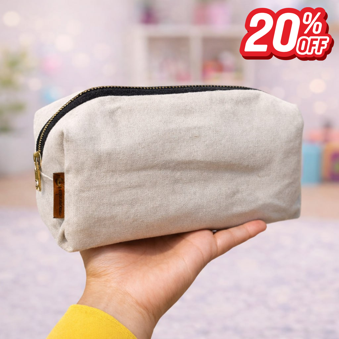 Hand holding a beige pouch with a blurred background and a 20% off label.